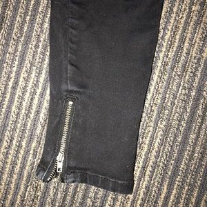 black jeans with gold zipper